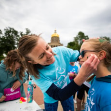 Girls on the Run participant getting tattoo