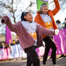 Girls on the Run participant and running buddy